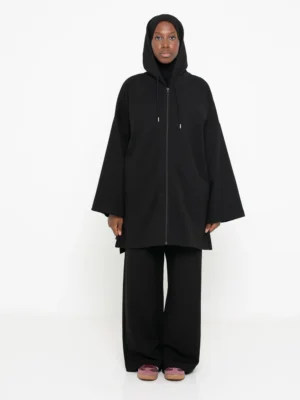 Veste longue noire en coton avec capuche, coupe ample et fluide